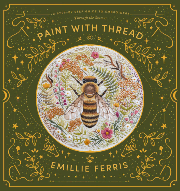 Book cover featuring gold embossing and a colour photograph of an intricately embroidered honey bee