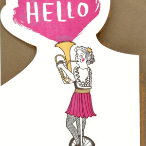 Photograph of illustrated card featuring a tuba-player riding a unicycle